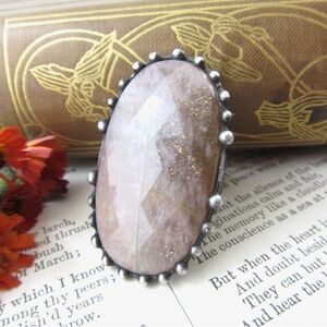 Large Sunstone adjustable ring.